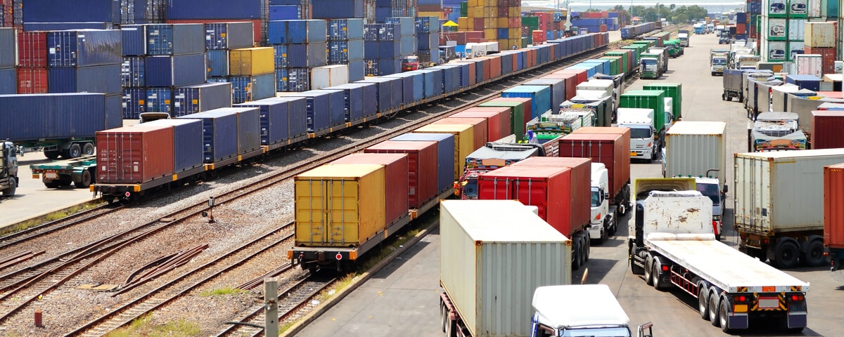 Intermodal land transport of goods by truck or train