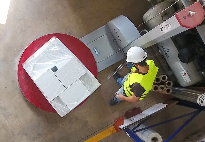 Strapping and shrink wrapping of packages before storage to protect the goods.
