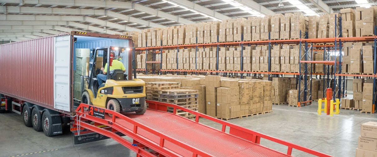 Unloading of sea container inside the Logistics Warehouse in Murcia - Grupo Marítima Sureste